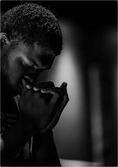 Person in prayer